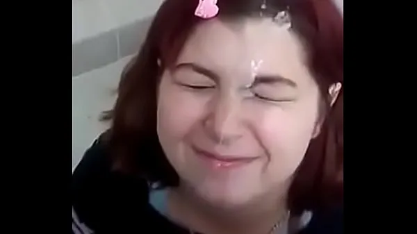 Xem Redhead with a face full of milk in a public bathroom Video mới